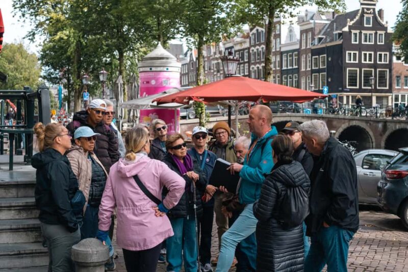 Amsterdam: Anne Frank Walking Tour - Starting at Dam Square: The Meeting Point and First Impressions
