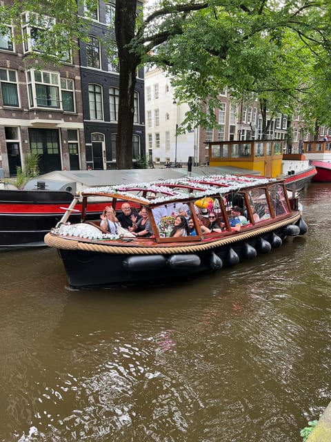 Amsterdam: Boat Tour with Optional Unlimited Drinks - Amsterdam: Boat Tour with Optional Unlimited Drinks - An Elegant Canal Experience for Just $27