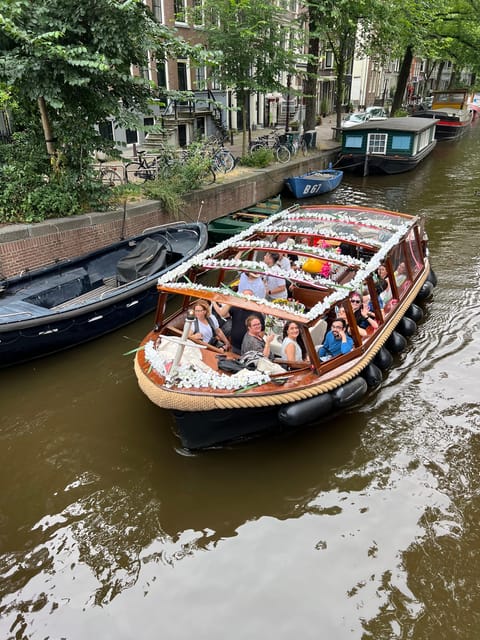 Amsterdam: Boat Tour with Optional Unlimited Drinks - Inside the Luxury Boutique Boat: Comfort and Style