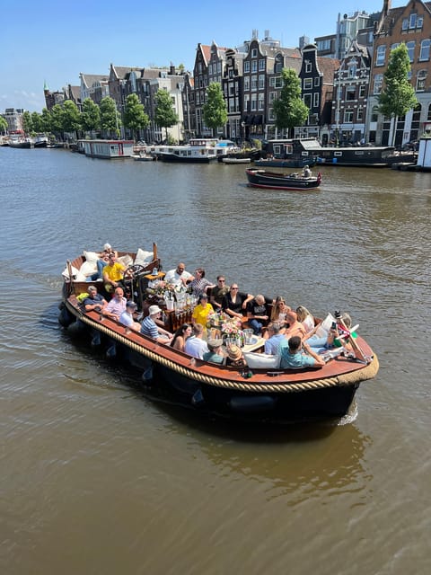 Amsterdam: Boat Tour with Optional Unlimited Drinks - Drinks, Atmosphere, and Entertainment