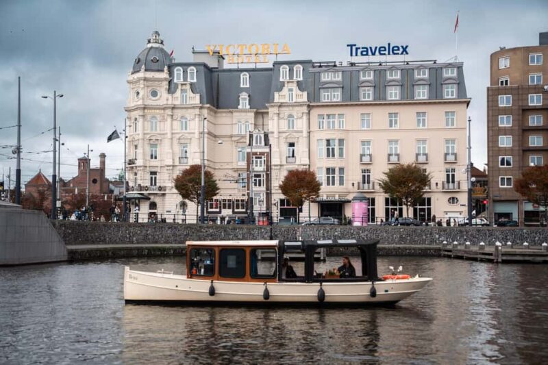 Amsterdam Canal Boat Tour with Live Guide - Explore Amsterdam’s Canals on a Cozy Boat with a Live Guide