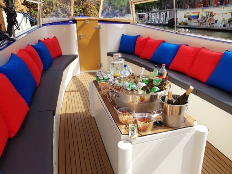 Amsterdam: Canal Booze Cruise with Unlimited Drinks Option - The Experience of a Partly-Covered Electric Boat