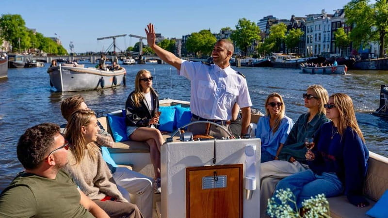 Amsterdam: Canal Cruise in Open Boat with Drink Option - Amsterdams Best Short Canal Experience with a Personal Touch