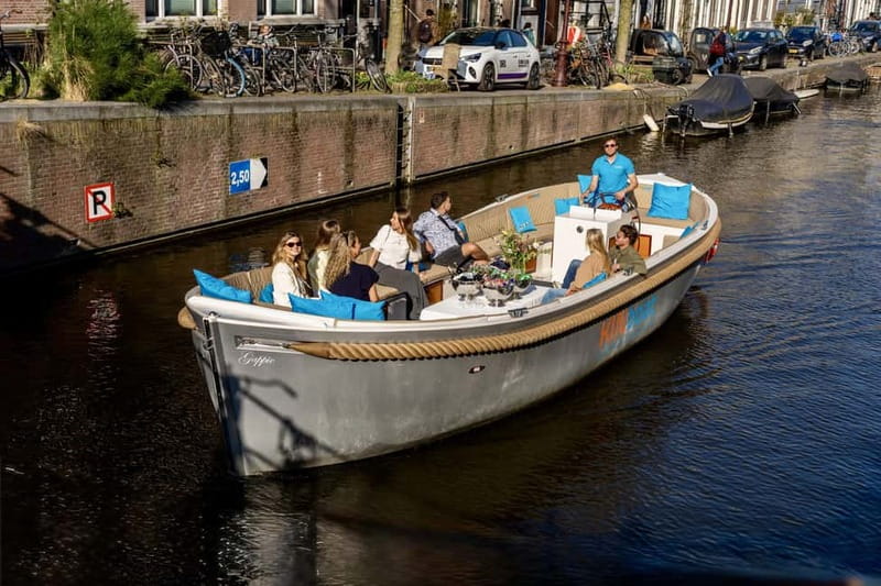 Amsterdam: Canal Cruise in Open Boat with Drink Option - Scenic Landmarks That Make the Waterways Special