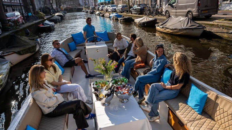 Amsterdam: Canal Cruise in Open Boat with Drink Option - The Experience: Comfort, Atmosphere, and Insights