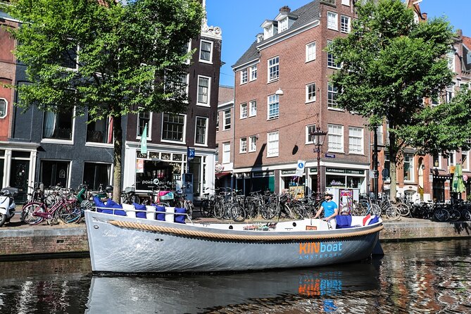 Amsterdam Canal Cruise in Open Boat with Unlimited Drinks Option - Limitations and Considerations for Booking