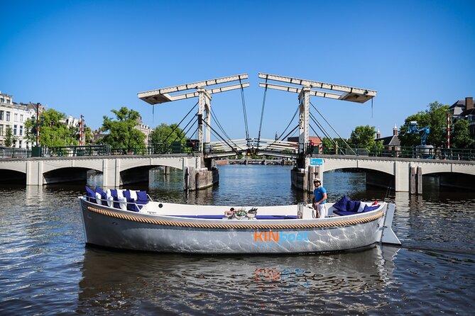 Amsterdam Canal Cruise in Open Boat with Unlimited Drinks Option - Comparing This Tour to Other Experiences in Amsterdam
