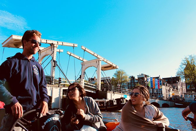 Amsterdam Canal Cruise on a small open boat (max 12 guests) - Small Group Size Delivers Personal Attention and Comfort