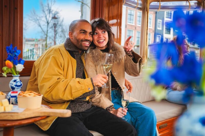 Amsterdam: Canal Cruise with Bubbles & Bites - The Comfort and Convenience of the Covered Boat