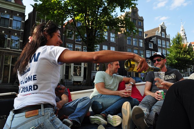 Amsterdam Canal Cruise With Live Guide and Unlimited Drinks - Key Points