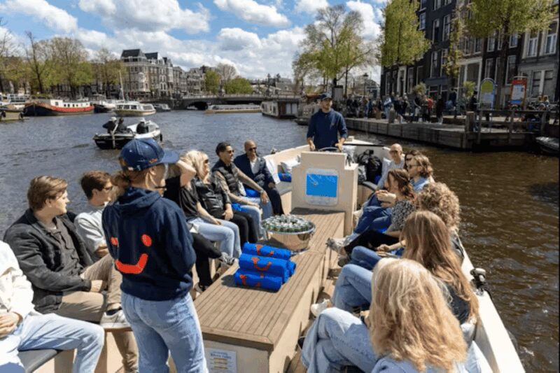 Amsterdam: City Highlights Small Boat Canal Cruise with host - Key Points