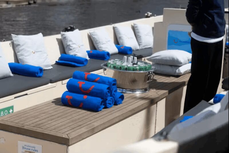 Amsterdam: City Highlights Small Boat Canal Cruise with host - Practical Details and Logistics