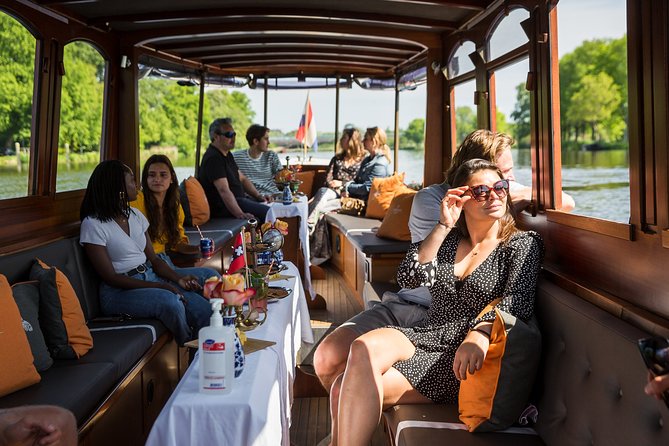 Amsterdam Classic Saloon Boat Cruise, Drinks and Cheese Option - Accessibility and Practical Tips for Booking