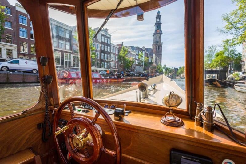 Amsterdam: Classic Saloon Boat Cruise with Cheese & Wine - In Summary: A Cozy, Informative, and Tasty Tour