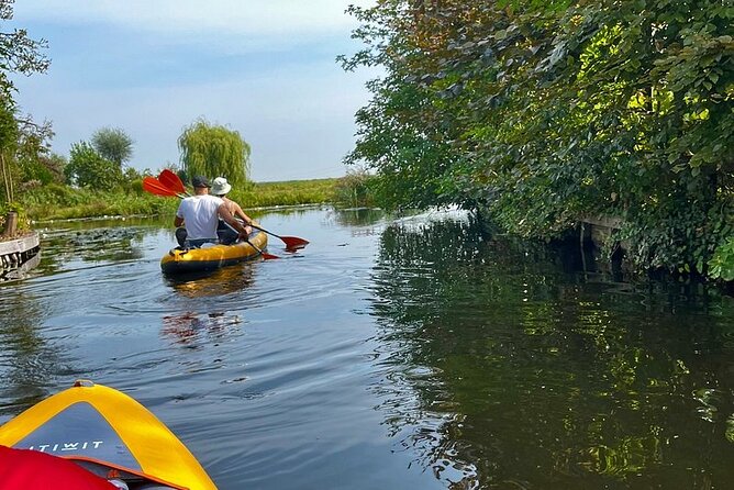 Amsterdam Countryside Bike and Kayak Tour - Cycling Past Zunderdorp on the Return Journey