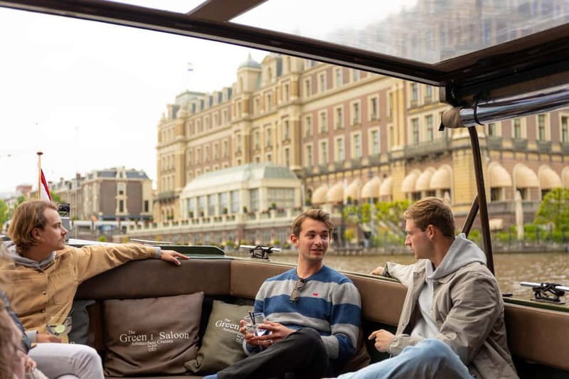 Amsterdam: Covered Heated Canal Cruise with Bitterballen - The Cozy Green Saloon: Your Floating Living Room
