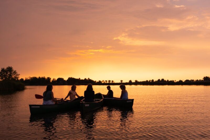 Amsterdam: Dutch Countryside Sunset Canoe Tour - Opportunities for Swimming and Relaxation on Warm Evenings