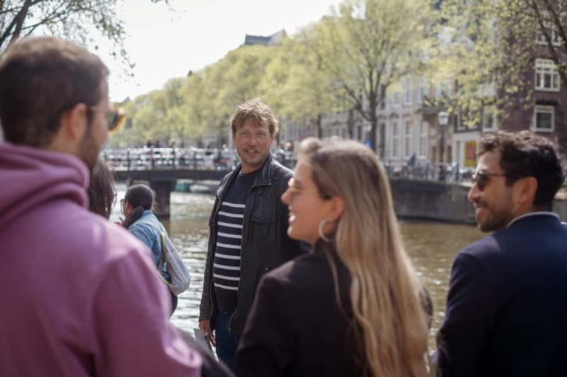Amsterdam Essentials: From Swamps to Riches - Starting Point at Beursplein 5 and the Bronze Bull Statue