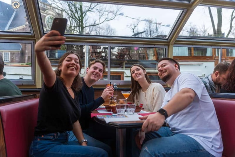 Amsterdam: Evening Cocktail Cruise Along The Canals - What Makes the Cruise a Scenic Nighttime Tour