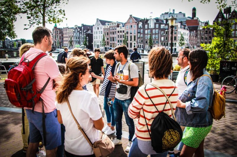 Amsterdam full day: Walking, Biking & Cruising - Starting Point at Beursplein 1 and Early Morning Meet-up