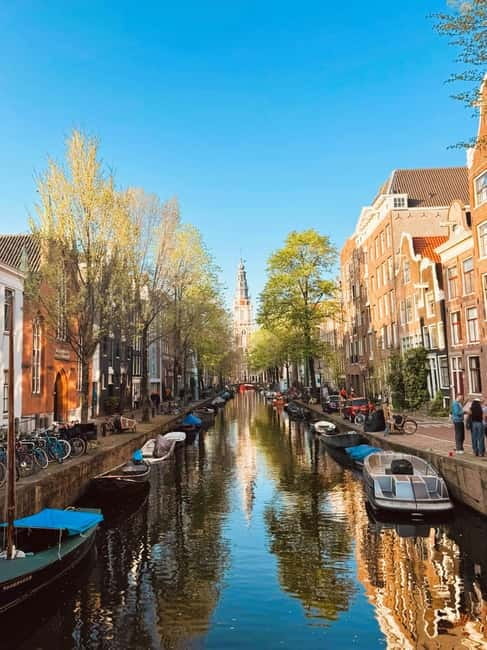 Amsterdam: Guided bike tour in French off the beaten track - Discover Amsterdam’s Authentic Neighborhoods by Bike