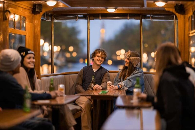 Amsterdam: Heated Canal Cruise with Unlimited Drinks & Bite - Comfortable Seating and Weather Options for Every Season