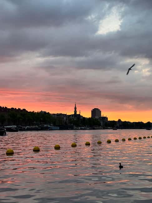 Amsterdam: Hidden Gems Walking Tour with a Local Guide - Exploring the Historic Center: From Centraal to Dam Square