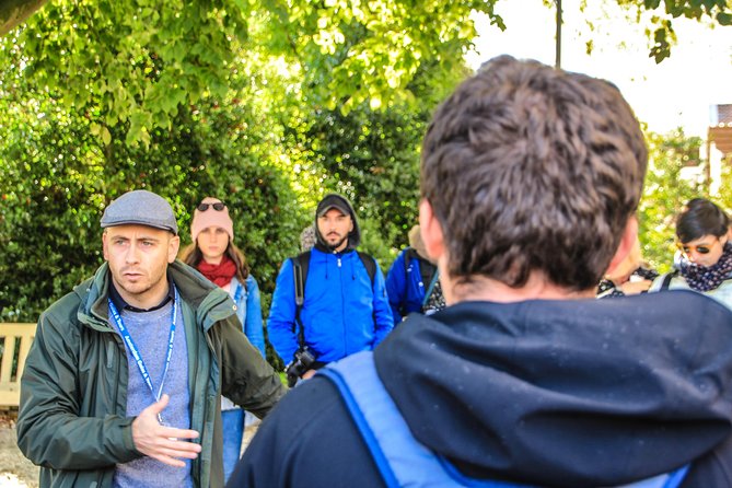 Amsterdam Highlights Small-Group Walking Tour - The Begijnhof Gardens and Historical Landmarks