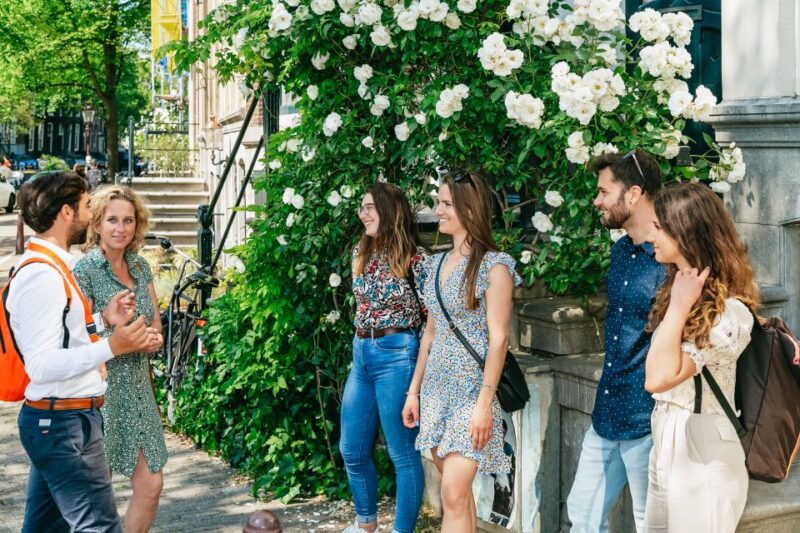 Amsterdam: Historical Highlights Walking Tour with Tasting - Exploring the UNESCO Canal District and Historic Bridges