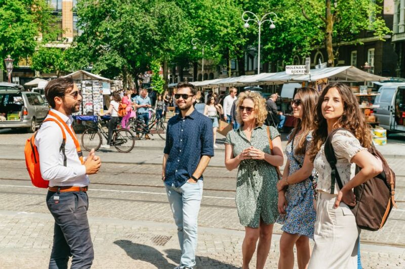 Amsterdam: Historical Highlights Walking Tour with Tasting - Walking Through Medieval Streets and Wide Canals