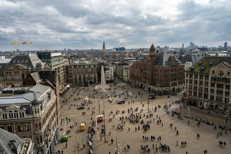 Amsterdam: Iconic Canals & Historic Sights Walking Tour - Exploring the Heart of Amsterdam from Dam Square