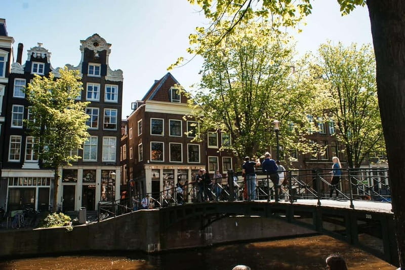 Amsterdam: Iconic Canals & Historic Sights Walking Tour - Comparing This Tour to Other Amsterdam Experiences
