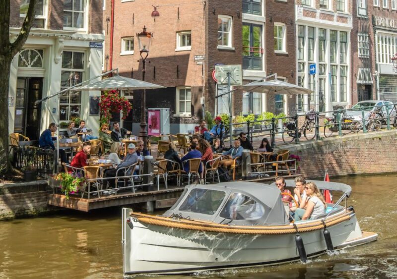 Amsterdam: Jordaan District Tour with a German guide - Practical Details: Meeting Point, Accessibility, and Group Options