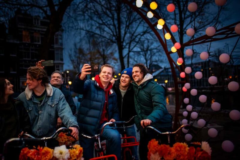 Amsterdam: Light Festival Bike Tour with Guide - Explore Amsterdam’s Light Festival on a Guided Bike Ride for $22