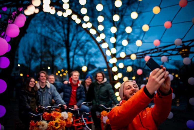 Amsterdam: Light Festival Bike Tour with Guide - Highlights of the Light Festival Art Installations and Landmarks