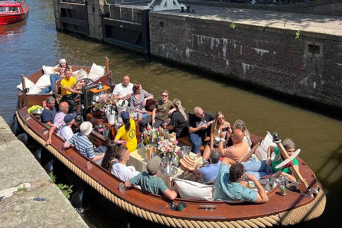 Amsterdam Luxury Boutique Boat tour with Unlimited Beer and Wine - Potential Drawbacks and Practical Tips