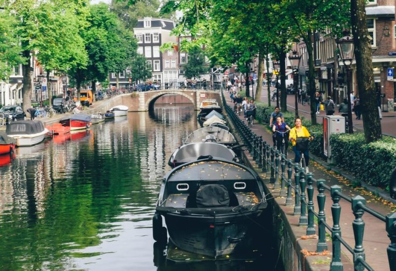 Amsterdam: Mike's Urban Bike Tour, Graffiti & Magnet Fishing - Crossing the IJ: Ferry Ride into Amsterdam Noord