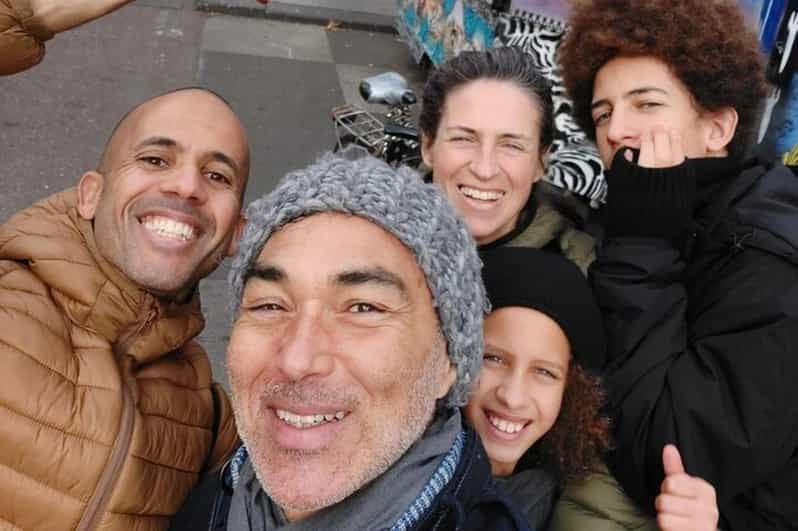 Amsterdam: Must-See Attractions Guided Walking Tour - Discover the Tranquil Begijnhof Courtyard and Its Surprising Secrets