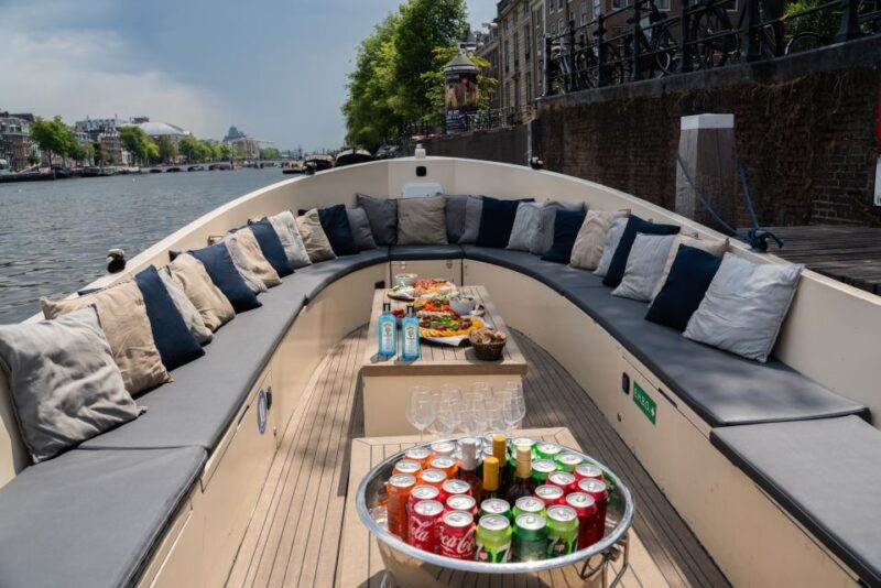 Amsterdam: Private Canal Booze Cruise with Unlimited Drinks - Departing from Oudezijds Voorburgwal 230