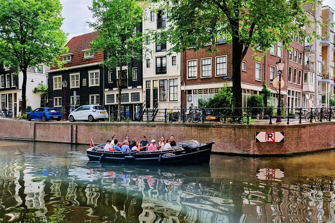 Amsterdam Private Canal Cruise 90 Minutes through the Old City - Exploring the Red-Light District and The Huis aan de Drie Grachten
