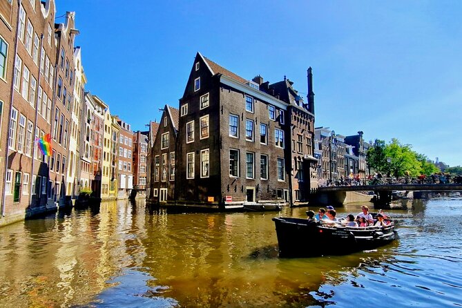 Amsterdam Private Canal Cruise 90 Minutes through the Old City - Experiencing the Oldest Church and the Kolksluis Passage