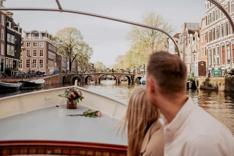 Amsterdam: Private Canal Cruise with snacks and drinks - Snacks, Drinks, and Local Treats on Board