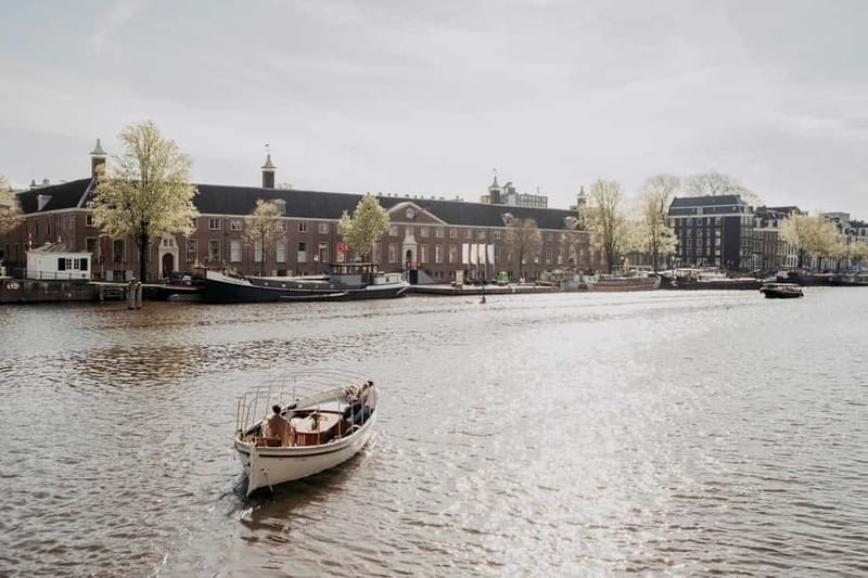 Amsterdam: Private Canal Cruise with snacks and drinks - Practical Details: Booking, Cancellation, and Accessibility
