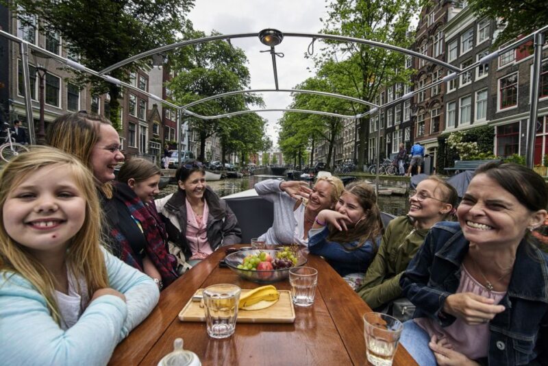 Amsterdam: Private Canal Tour - Iconic Landmarks: Seven Bridges and Dancing Houses