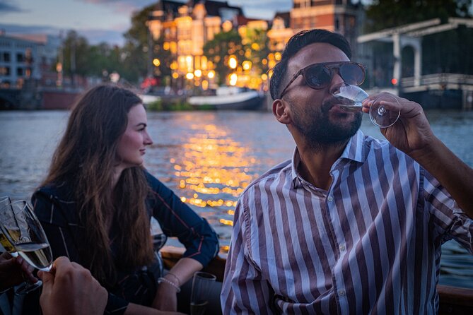 Amsterdam Private Dinner Cruise incl Drinks & 2-course Dinner 2hr - Scenic Route Highlights: Landmarks and Crowds-Free Sights