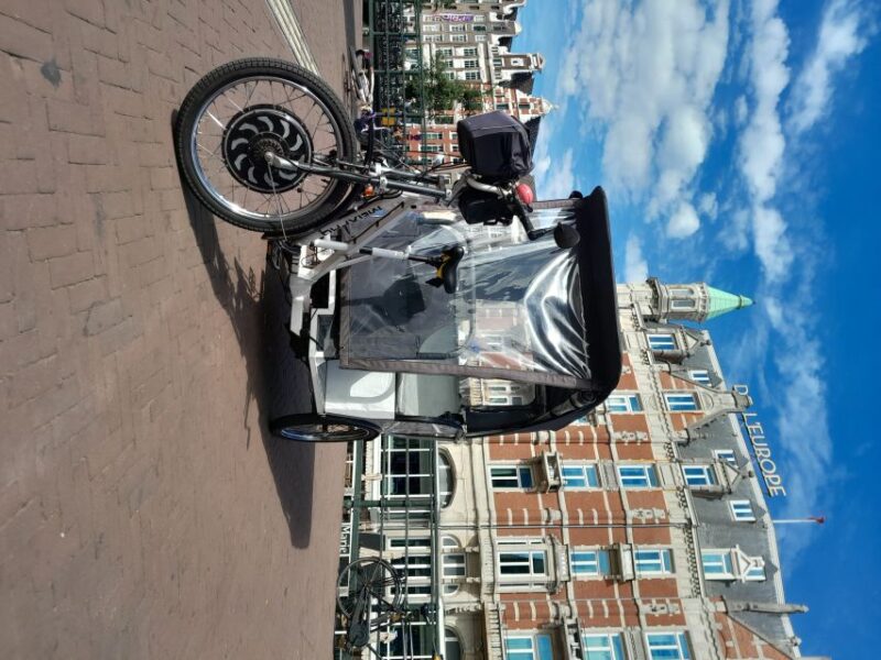 Amsterdam: Private Guided City Tour by Pedicab - Practical Details: Pickup, Language Options, and Group Size