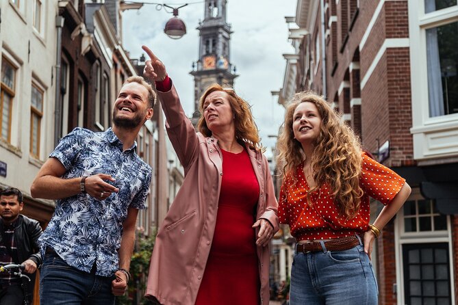 Amsterdam Private Tour: Highlights & Hidden Gems by Bike or Foot - Experience the Lively Atmosphere of Rembrandtplein