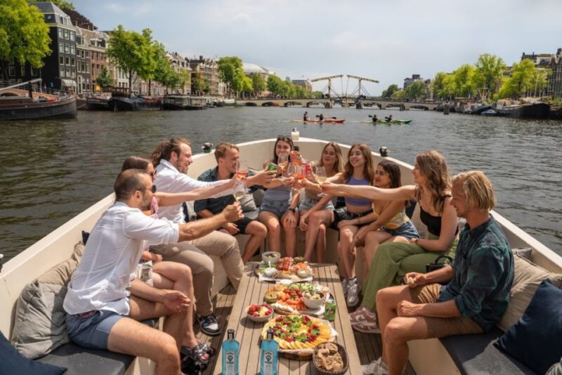 Amsterdam: Red-Light District Pub Crawl and Booze Boat Tour - The Pub Crawl Stops and Drinks Deals