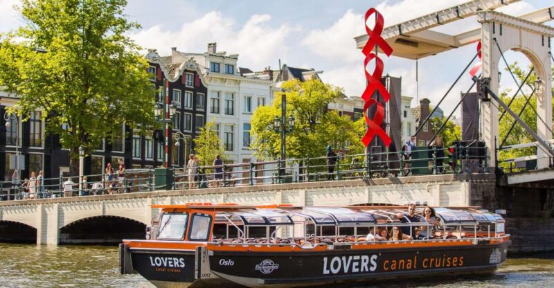 Amsterdam: Semi-Open Canal Boat Cruise - Experience the City from the Water on a Semi-Open Canal Boat