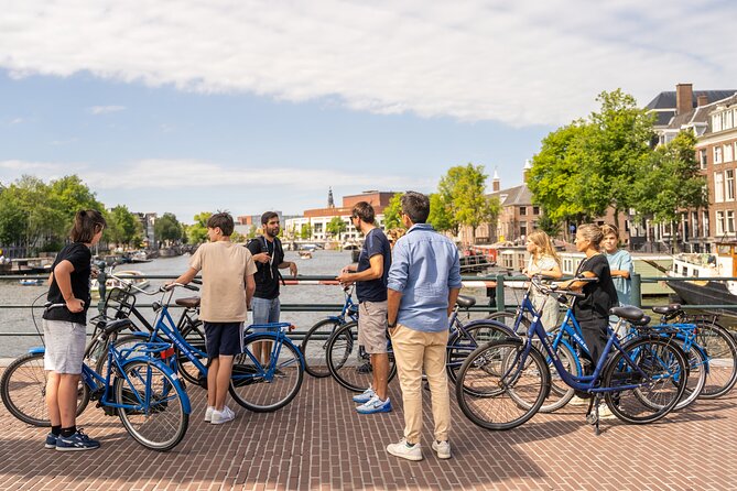 Amsterdam Small-Group Bike Tour With Canal Cruise, Drinks, Cheese - Cycling Through Vondelpark and Its Relaxing Atmosphere